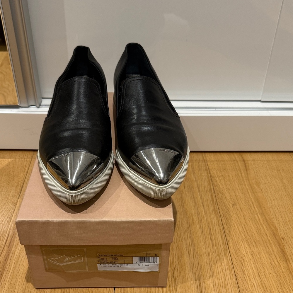 Miu Miu Black Leather Slip-On Sneakers with Silver Cap Toe